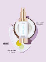 Tarte hair hydrator bottle with coconut and text on a light purple background