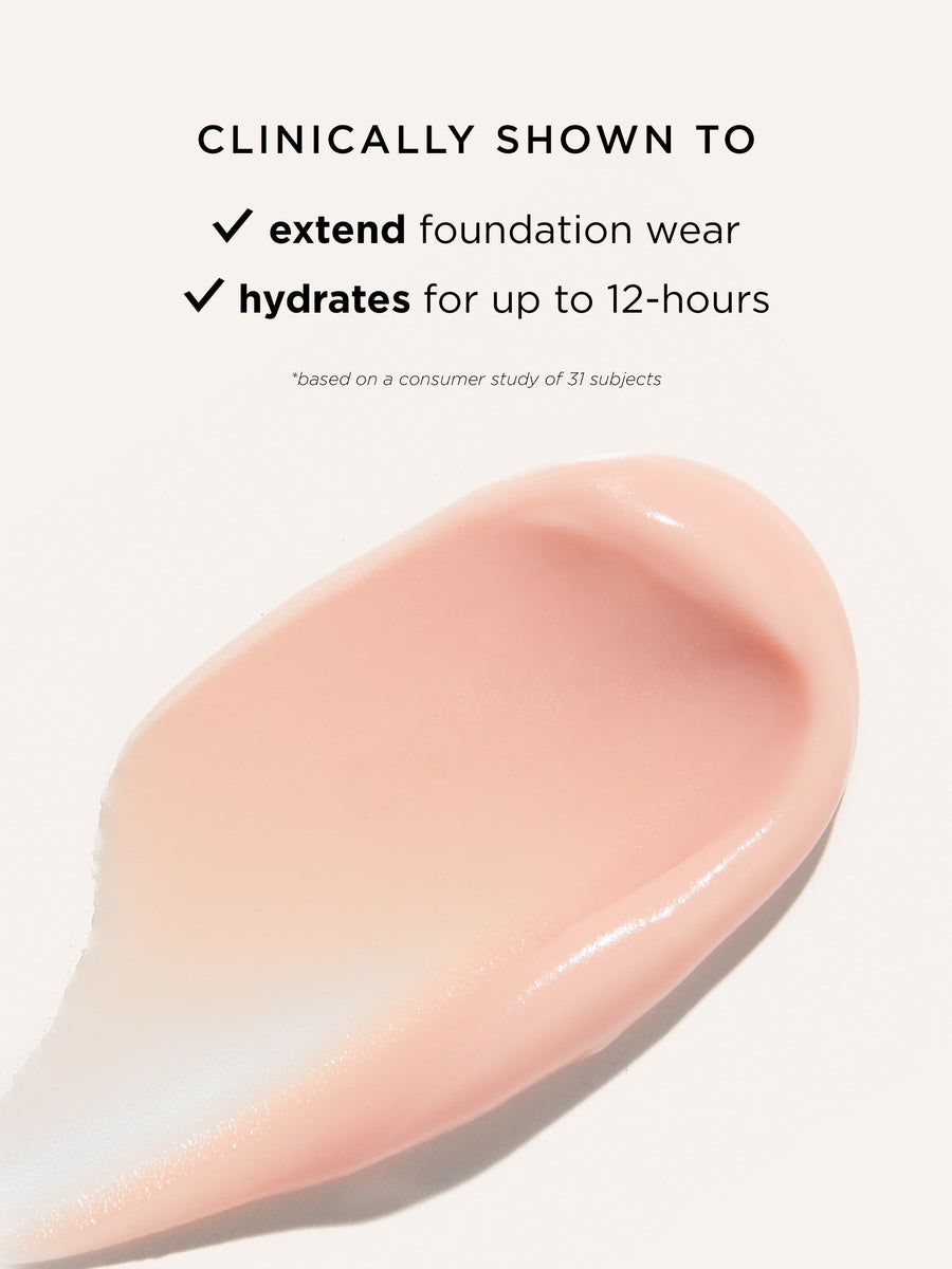 Close-up of pink cosmetic product with text about foundation wear and hydration on a white background