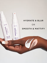 Two skincare products with a hand holding them and a swatch of product on skin, against a neutral background.