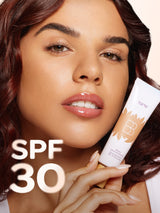 Tarte BB Blur tube with green leaves and a diamond on a white background