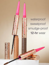 Makeup products with pink tips on a beige background