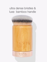 A makeup brush features ultra-dense bristles and a luxe bamboo handle, with tarte embossed on a metallic band. Text above reads: ultra dense bristles & luxe bamboo handle.