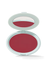 Compact blush in a white case on a white background