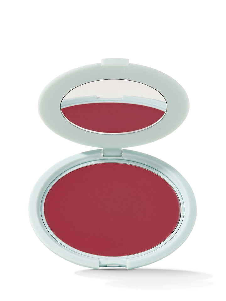 Compact blush in a white case on a white background
