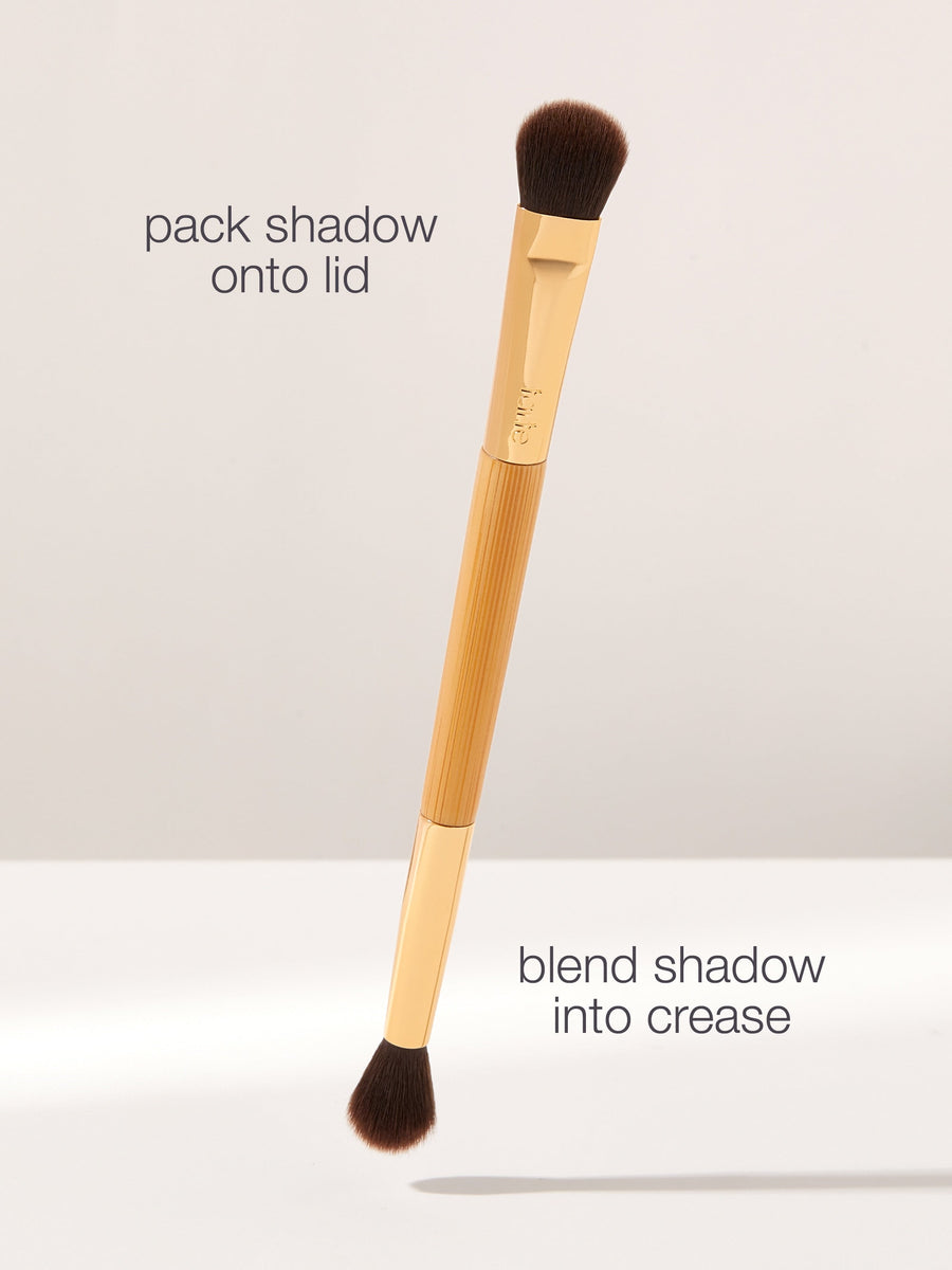 Makeup brush with text instructions on a light gray background