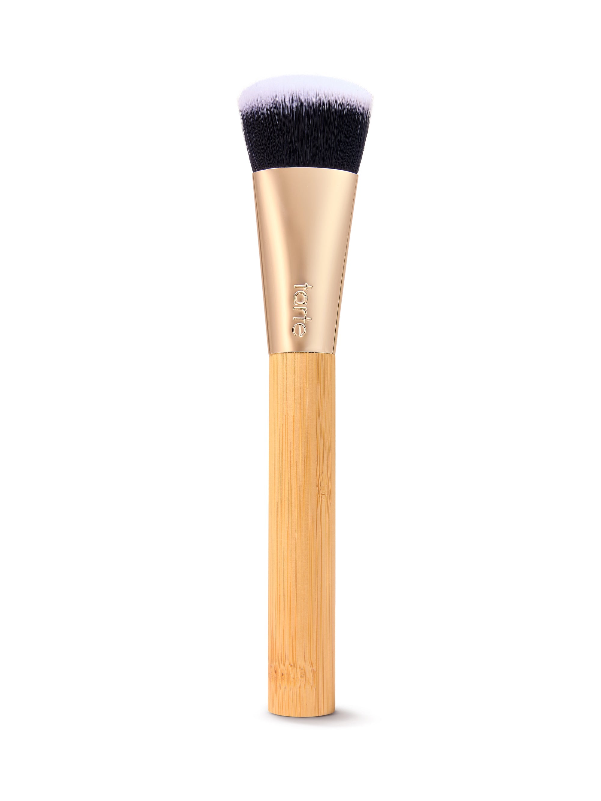 Makeup brush with wooden handle and black bristles on a white background