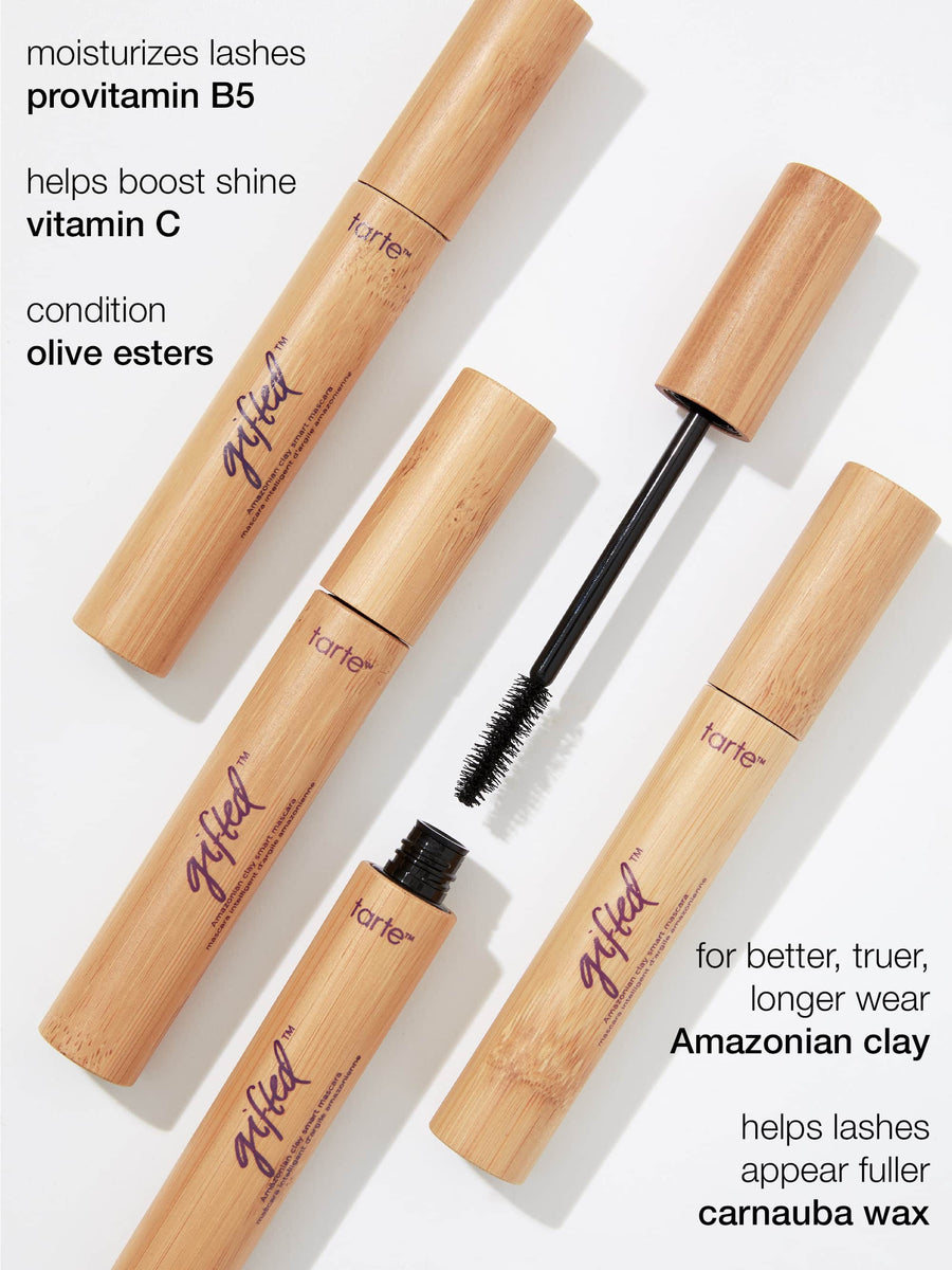Tarte mascara with wooden applicators on a white background