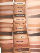 Makeup palette with color swatches labeled from 'charmer' to 'leader'.