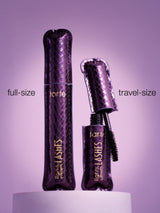 Two purple mascara containers, full-size and travel-size, on a purple background.