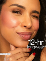 Close-up of a woman's face with makeup, featuring '12-hr longwear' text.