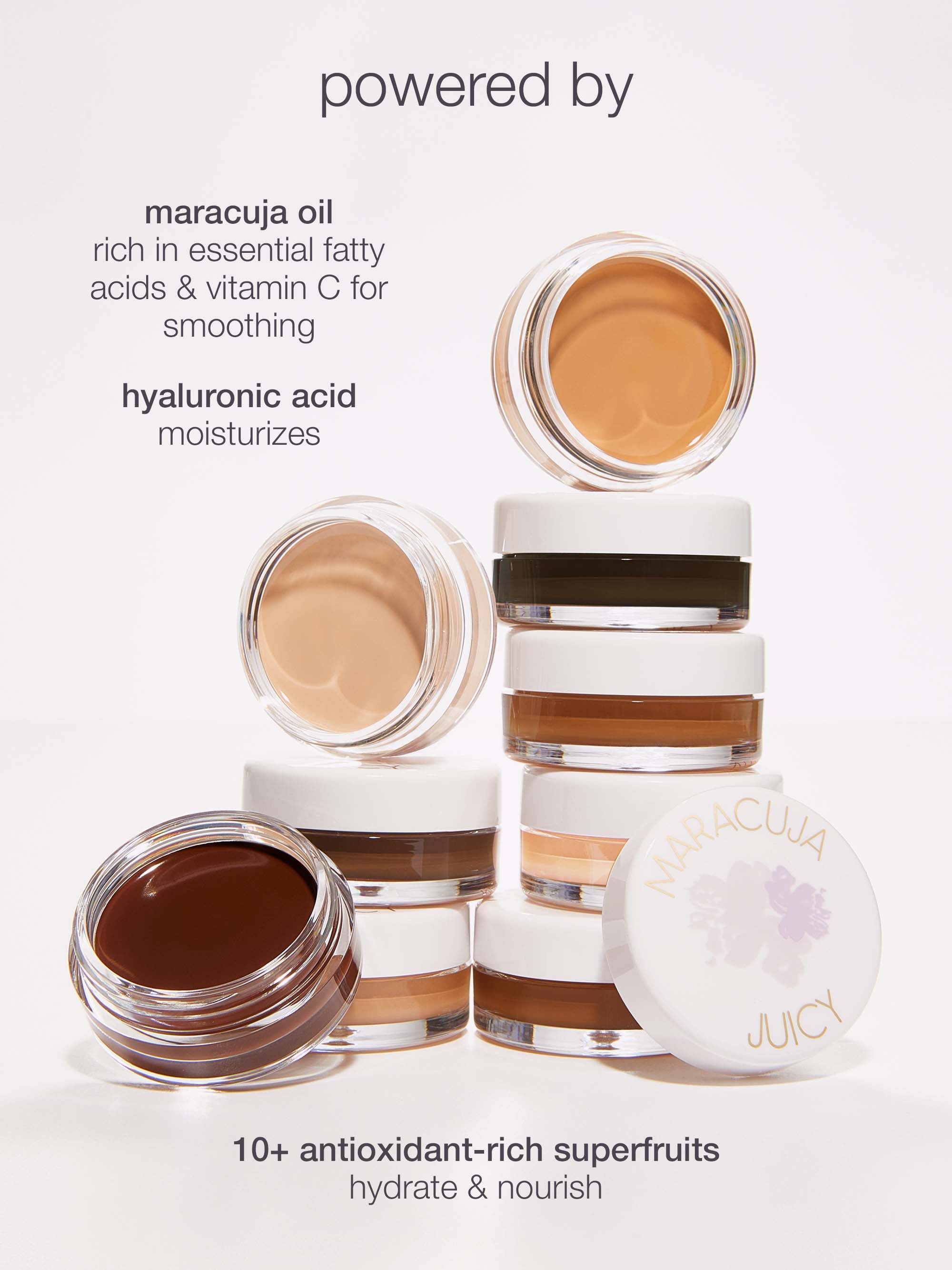 Cosmetic products with maracuja oil and hyaluronic acid on a white background
