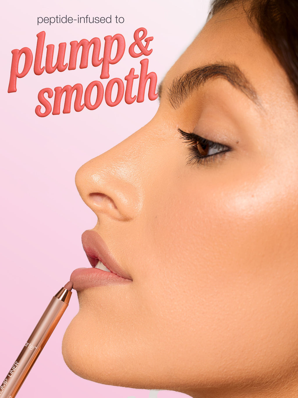 Close-up profile of a woman's lips as a Tarte lip pencil outlines them, applying liner against a soft pink background. Text: peptide-infused to plump & smooth