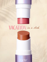 Tarte 'Vacation in a Stick' tarte maracuja juicy double ended multi stick  on a beige background