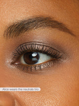 Close-up of a woman's eye with neutral makeup, featuring the brand 'Alice'.