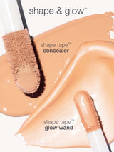 Shape tape concealer with applicator on a white background