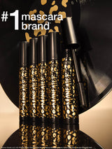 tarte maneater mascara with leopard print design on a reflective surface