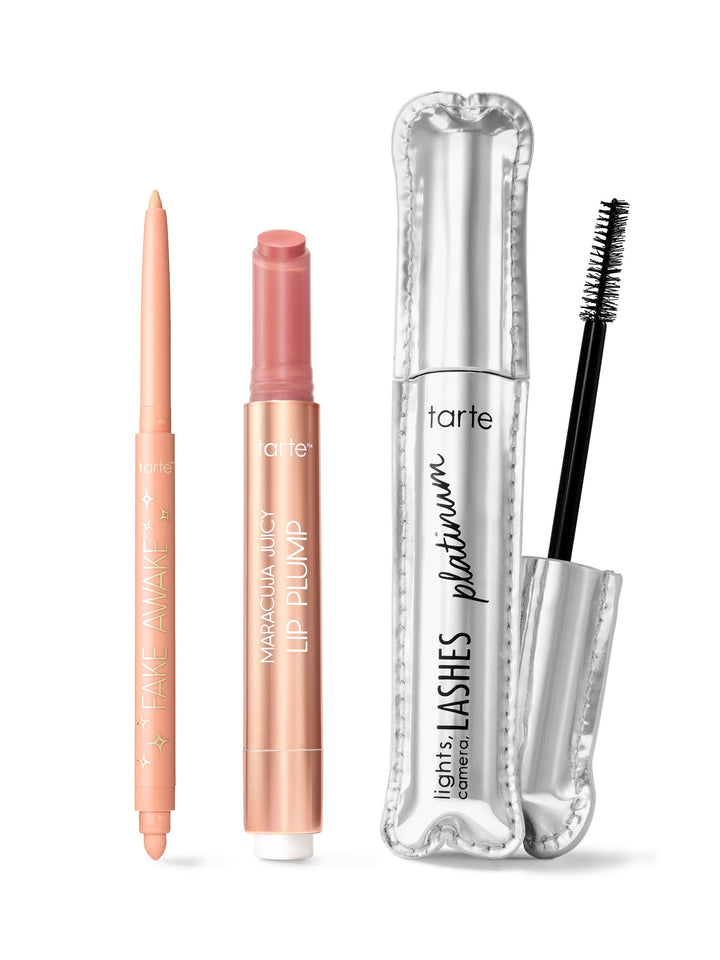 Tarte makeup products including a lip plump, eyeliner, and mascara on a white background
