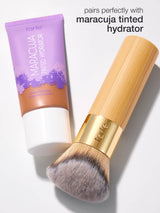 Tarte Maracuja Tinted Hydrator and brush on a white background