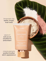 Tarte Amazonian Clay makeup product with ingredients on a leaf