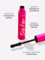 Pink Tarte Cosmetics mascara tube labeled Big Ego, displayed alongside wand. Text describes ingredients: vitamin B5 moisturizes lashes, glycerin hydrates and conditions, babassu nourishes lashes, sunflower seed wax moisturizes.