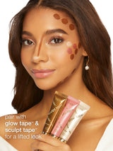 Woman with makeup swatches on her face, promoting cosmetic products.