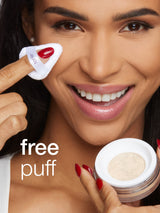 Woman holding a jar of powder with a free puff offer text