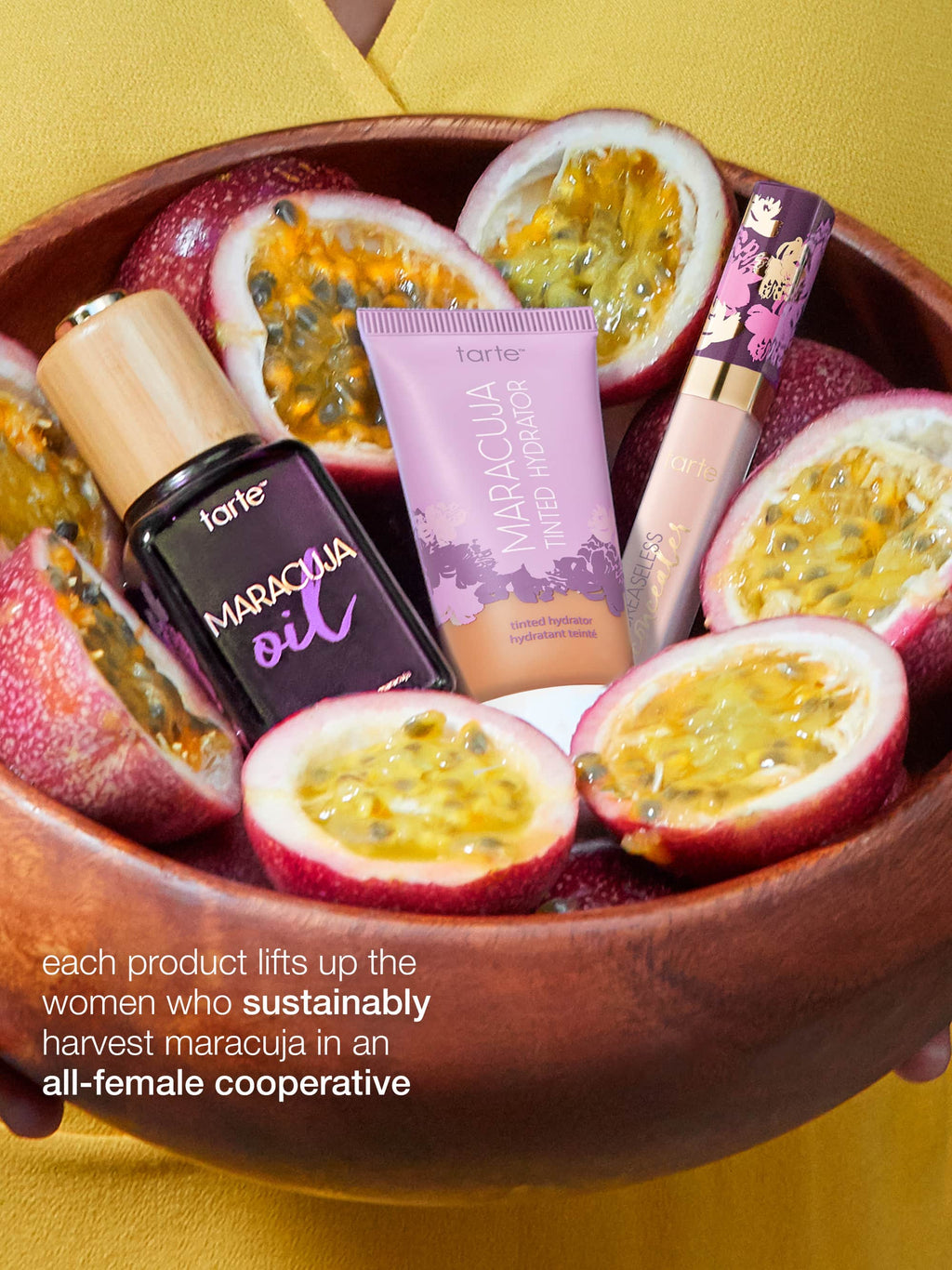 Tarte Maracuja skincare products in a bowl with passion fruits