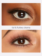 Close-up of an eye with eyelash extensions labeled 'full & fluttery drama'.