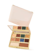 Makeup palette with various colors on a white background