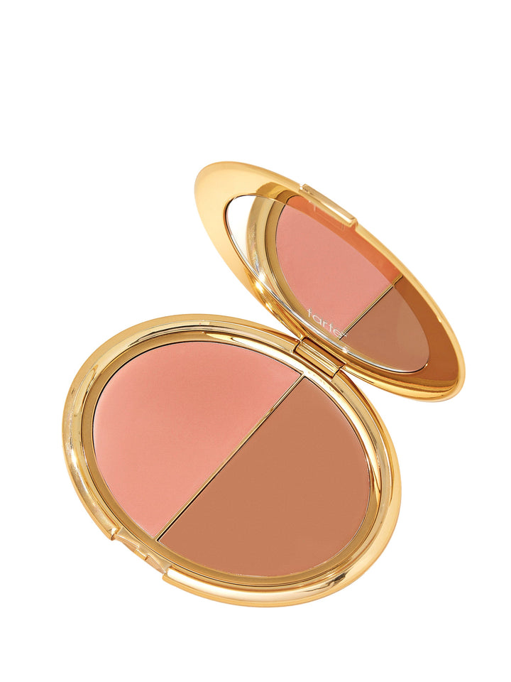 Makeup compact with two shades of blush on a white background