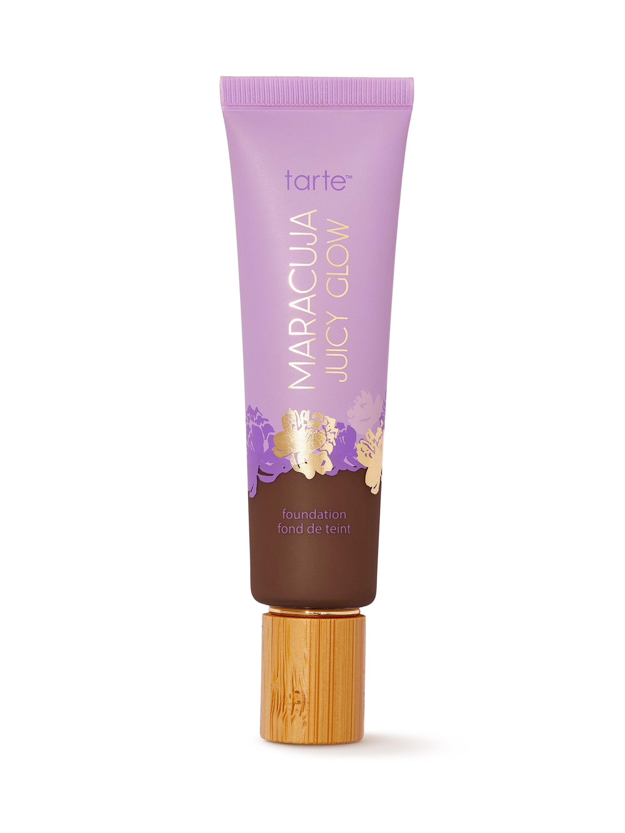 Tarte Maracuja Juicy Glow foundation tube with purple cap on a white background