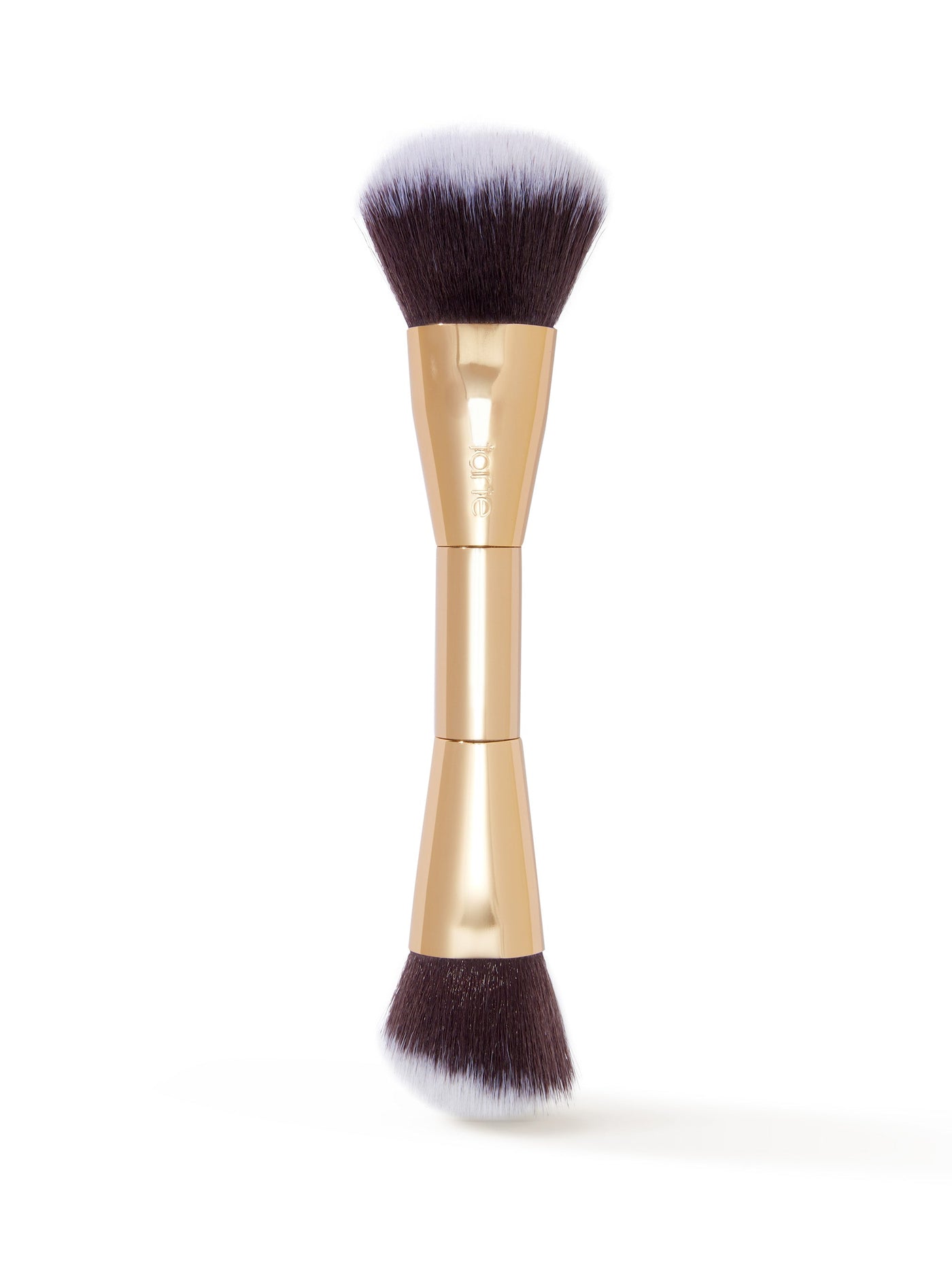 Makeup brush with gold handle and black bristles on a white background