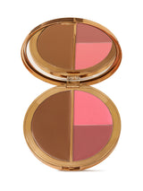 Makeup compact with brown, pink, and red shades on a white background