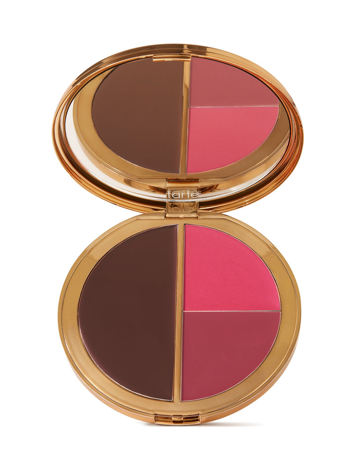 Makeup compact with brown, pink, and red shades on a white background