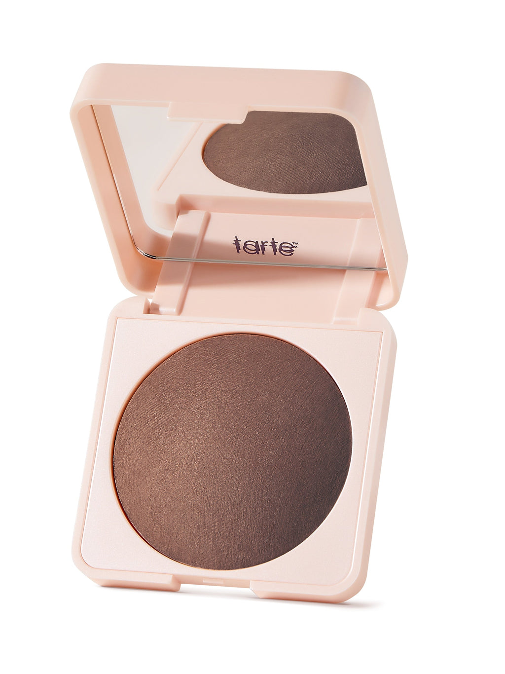 Open tarte makeup compact with brown powder on a white background