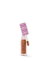 Tarte Shape Tape Glow Wand with applicator on a white background