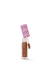 Tarte Shape Tape Glow Wand with geometric packaging on a white background
