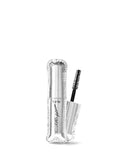 A travel-size tarte mascara with the wand applicator next to the tube, showcasing the clear serum formula.