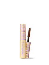 Mascara with a brush on a white background