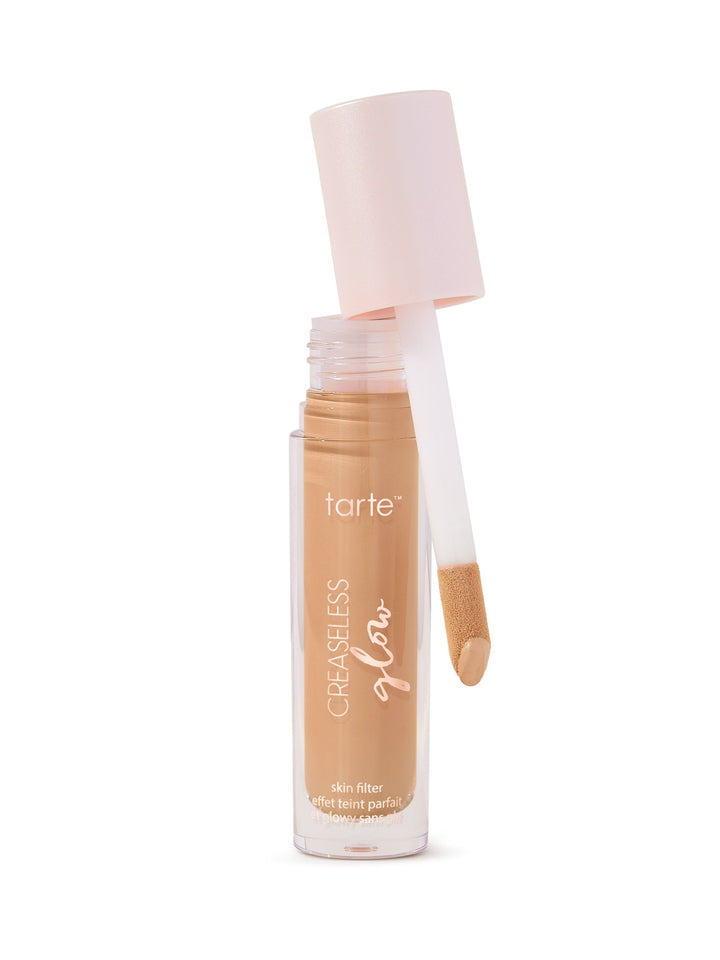 Tarte concealer bottle with applicator on a white background
