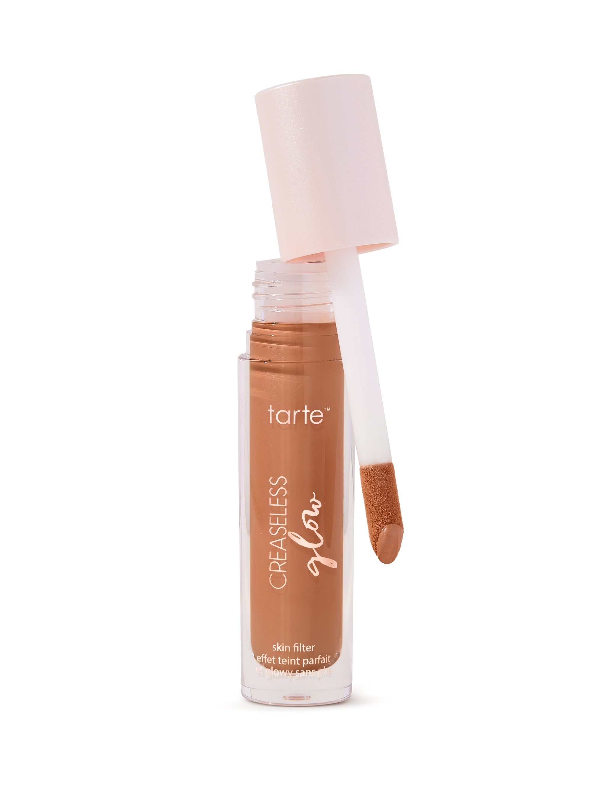 Tarte Cosmetics concealer with applicator on a white background