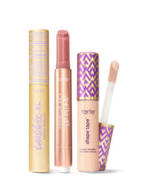 Collection of Tarte lip products including a tartelette tubing XL mascara, maracuja juicy lip plump, and tarte shape tape concealer. 