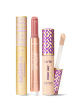 Collection of Tarte lip products including a tartelette tubing XL mascara, maracuja juicy lip plump, and tarte shape tape concealer. 
