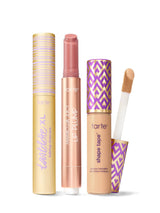 Collection of Tarte lip products including a tartelette tubing XL mascara, maracuja juicy lip plump, and tarte shape tape concealer. 