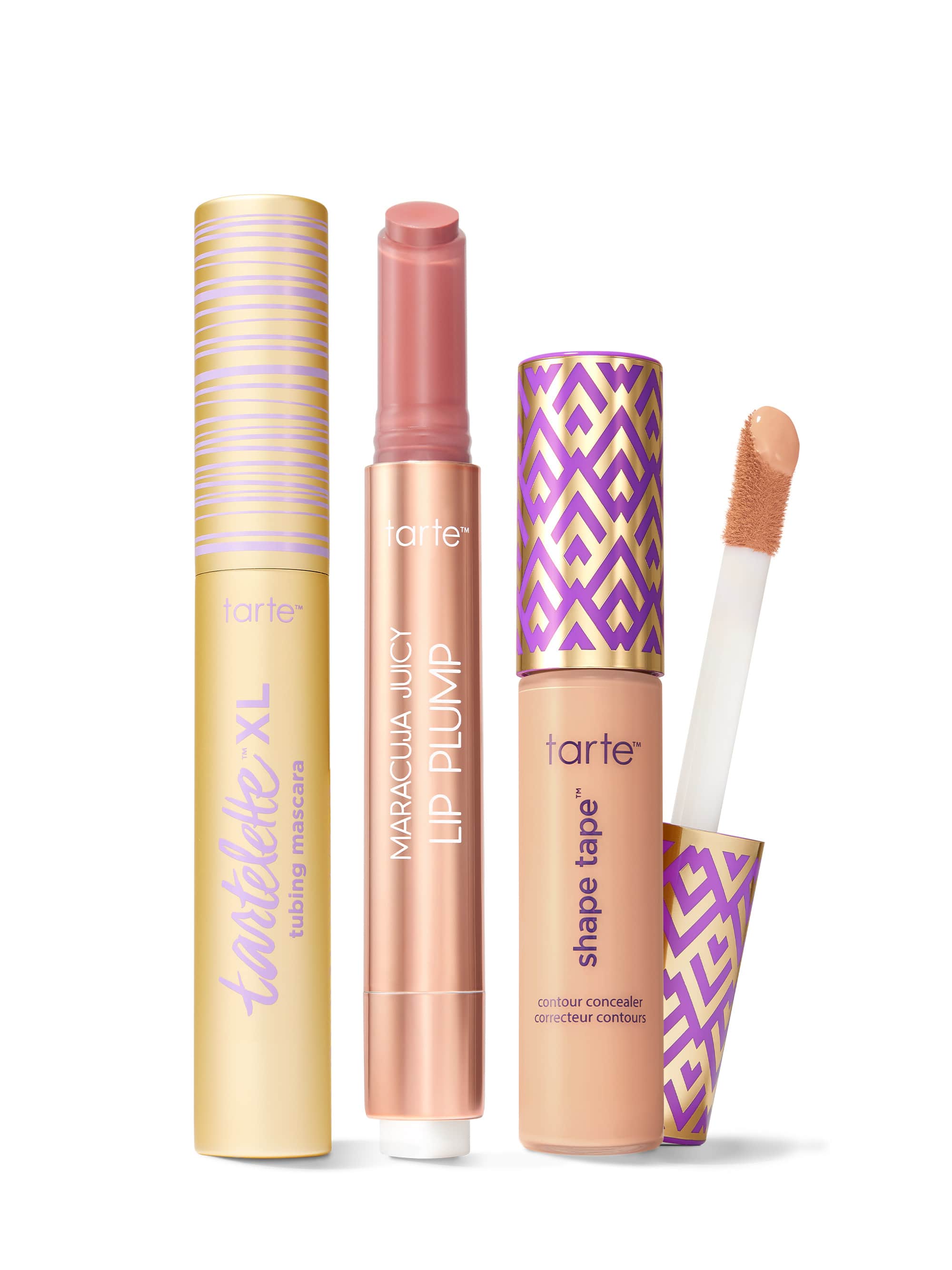 Collection of Tarte lip products including a tartelette tubing XL mascara, maracuja juicy lip plump, and tarte shape tape concealer. 