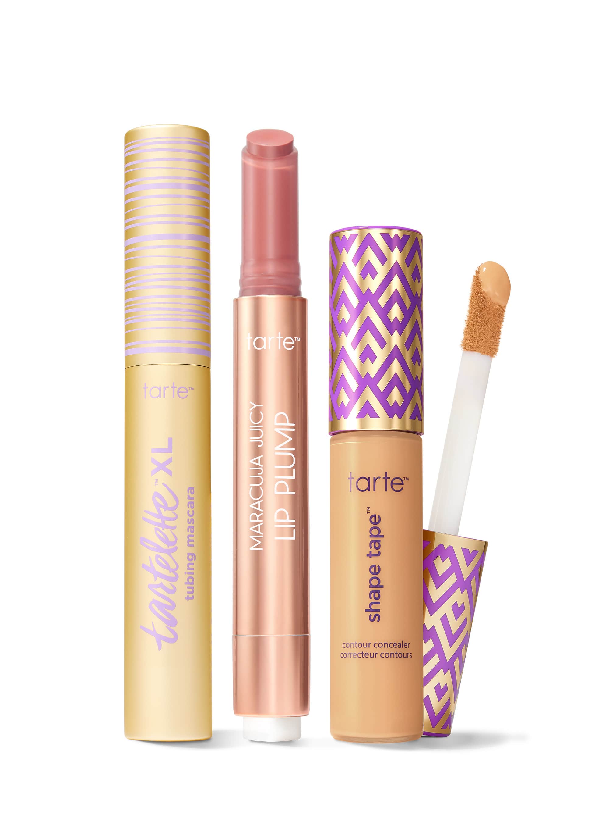 Collection of Tarte lip products including a tartelette tubing XL mascara, maracuja juicy lip plump, and tarte shape tape concealer. 