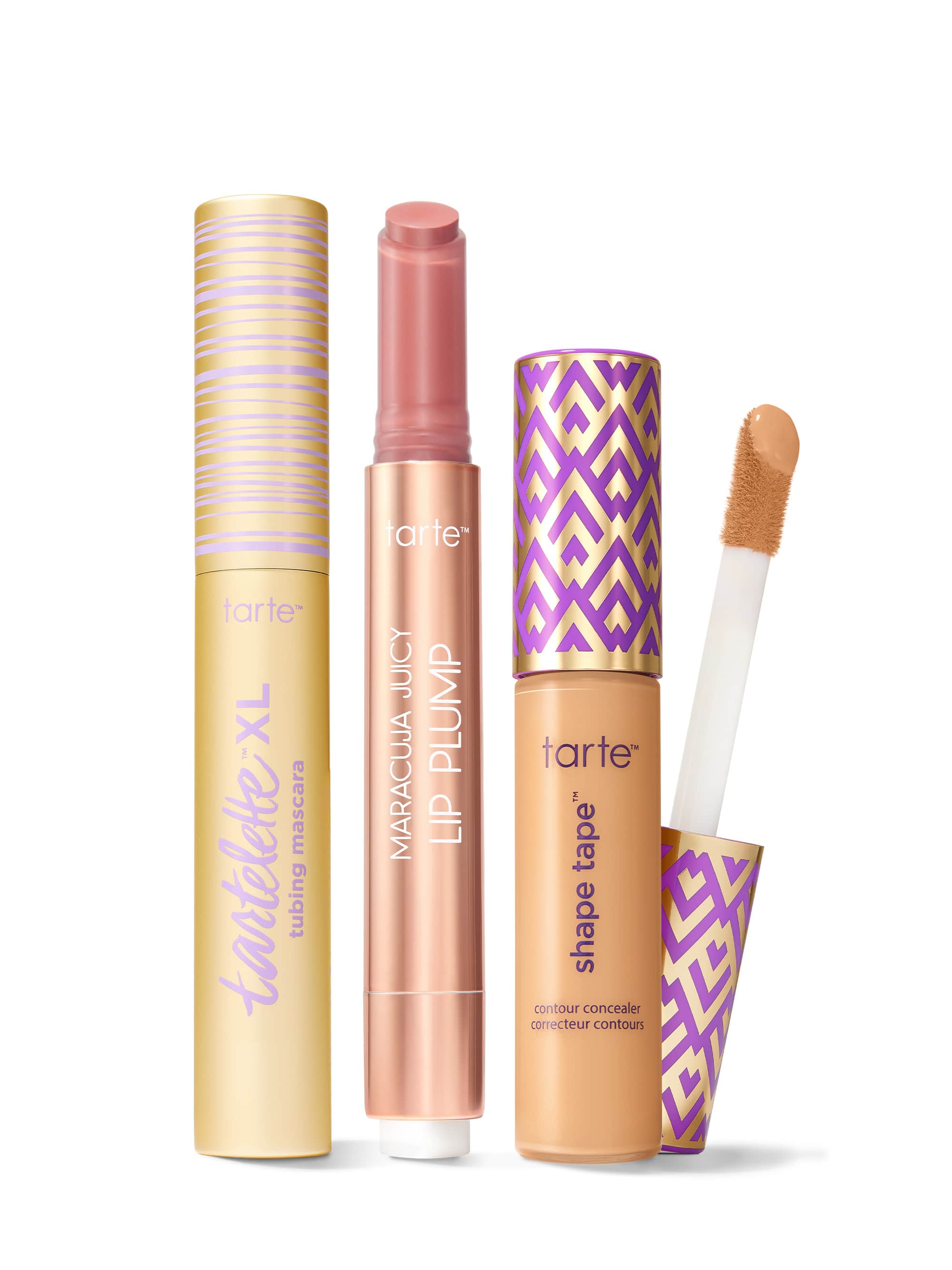 Collection of Tarte lip products including a tartelette tubing XL mascara, maracuja juicy lip plump, and tarte shape tape concealer. 