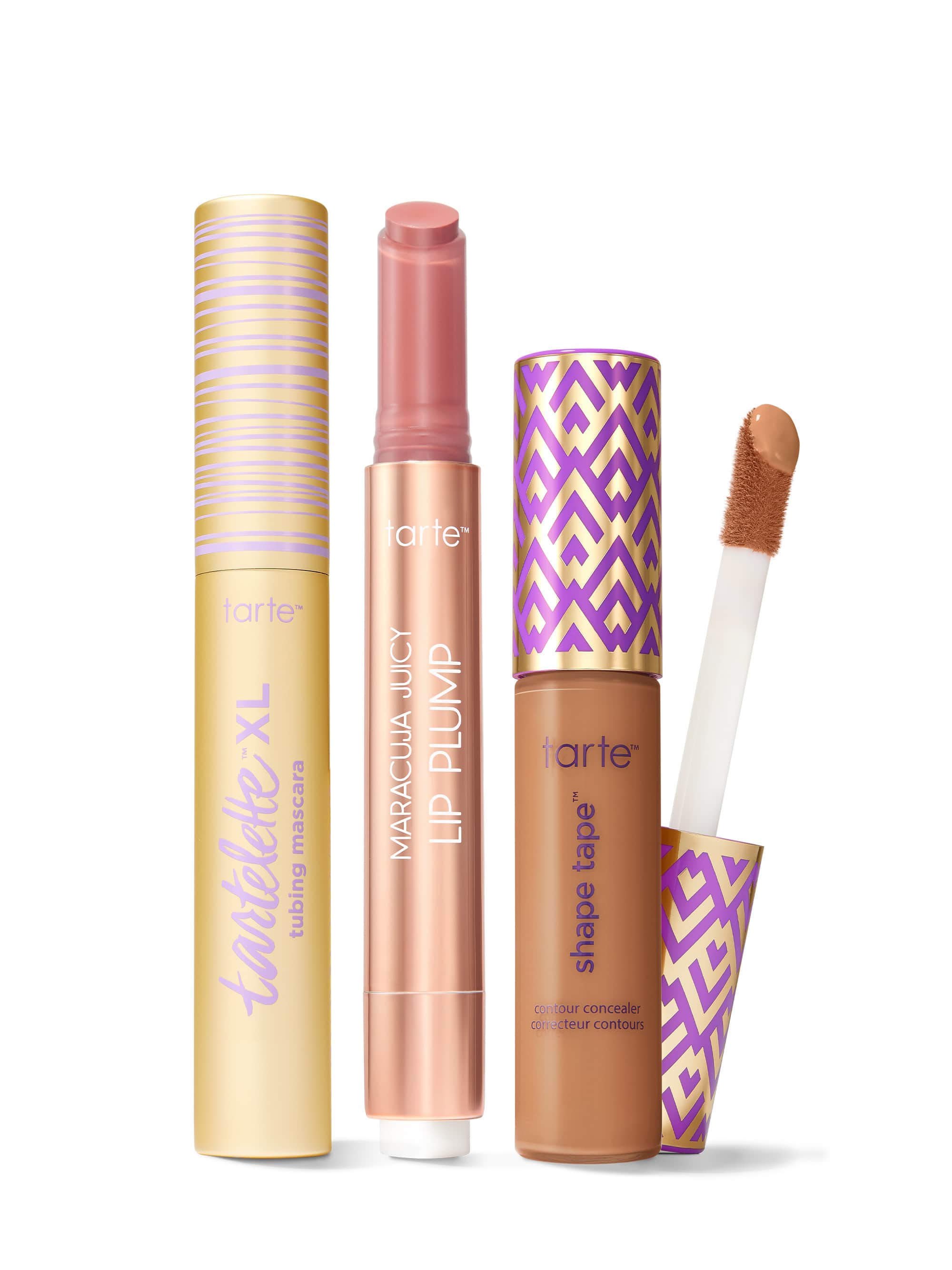 Collection of Tarte lip products including a tartelette tubing XL mascara, maracuja juicy lip plump, and tarte shape tape concealer. 
