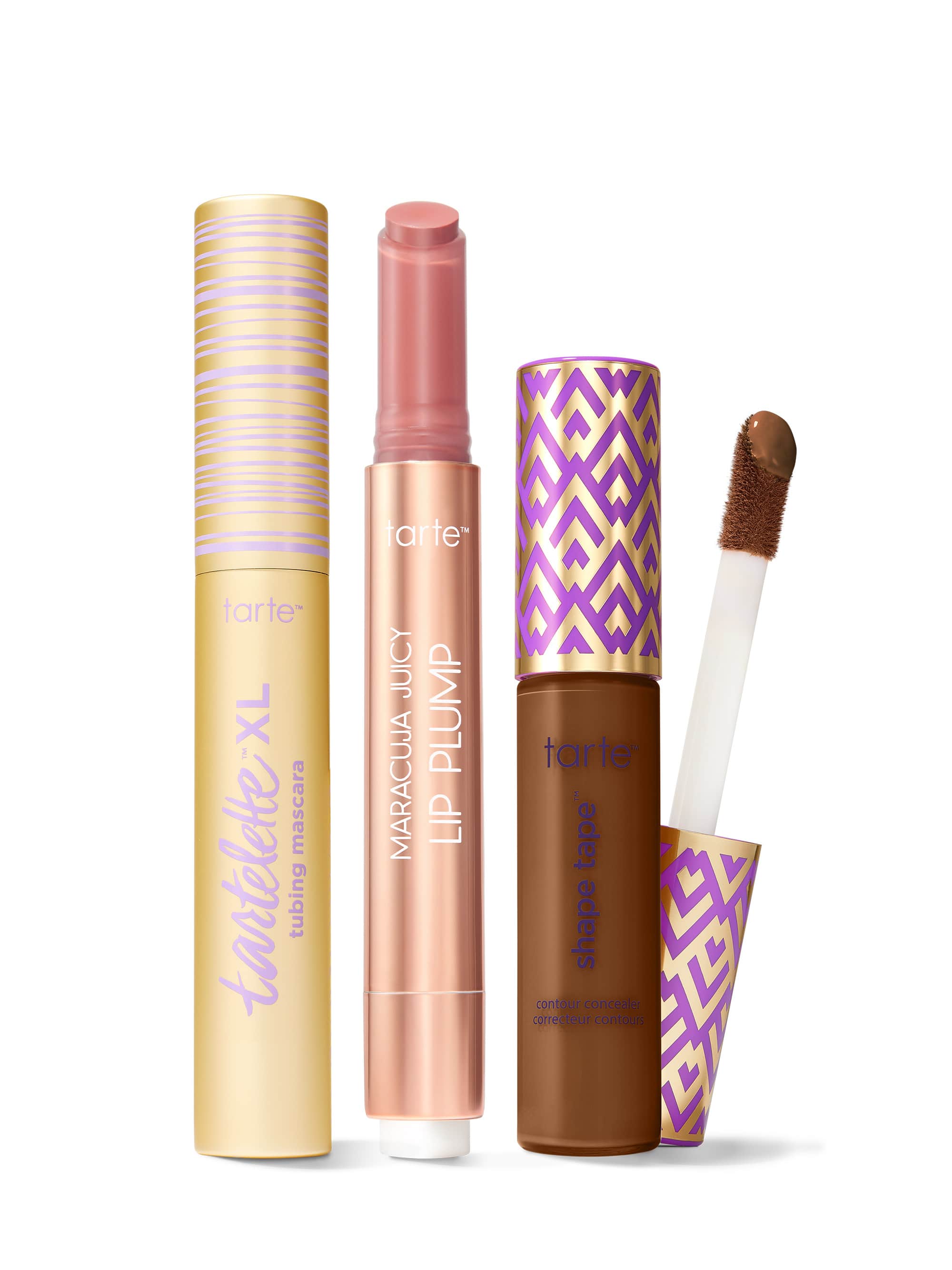 Collection of Tarte lip products including a tartelette tubing XL mascara, maracuja juicy lip plump, and tarte shape tape concealer. 