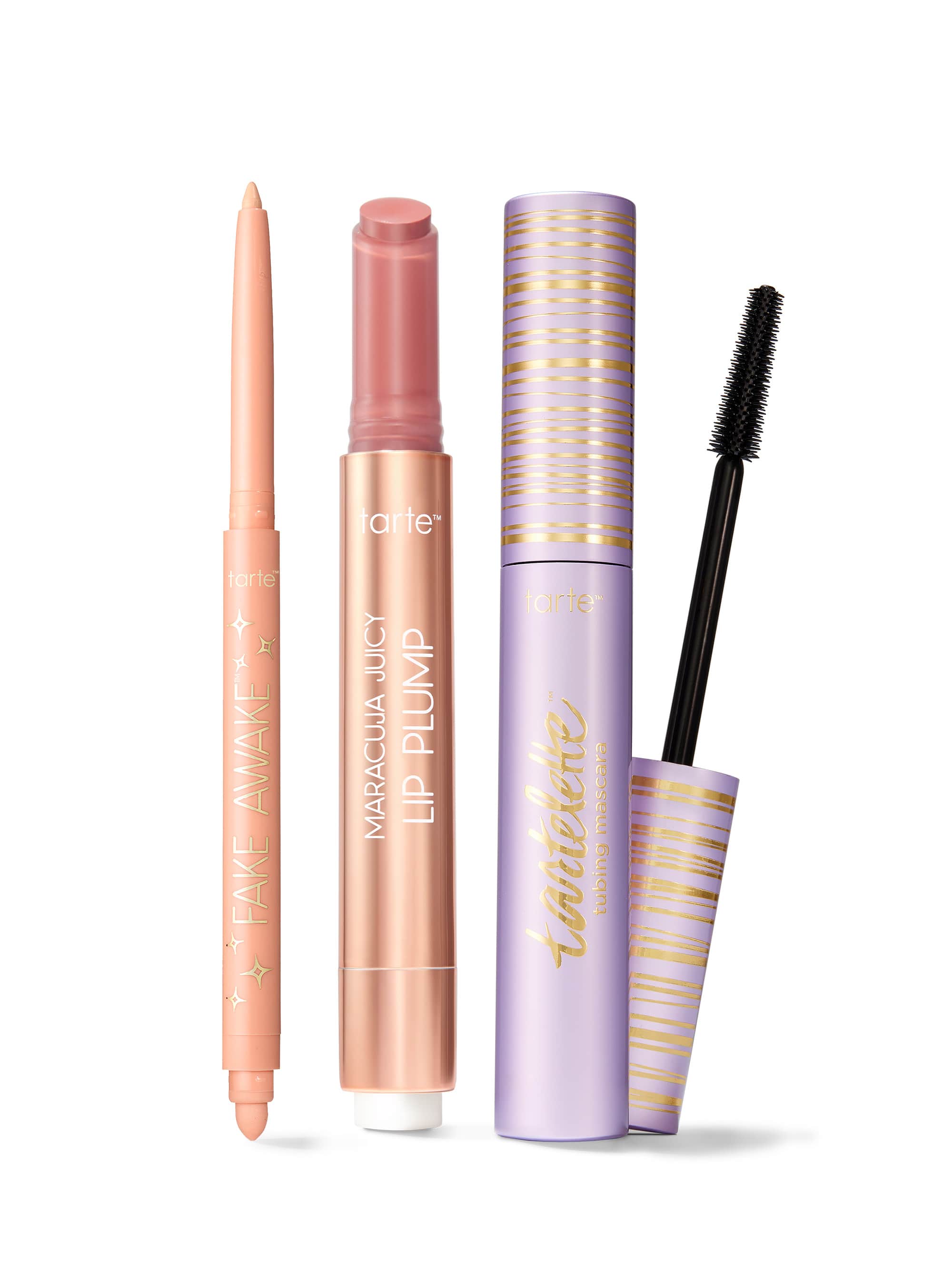 Set of makeup products including a tarte fake awake eye highlight, maracuja juicy lip plump, and tartelette tubing mascara. 
